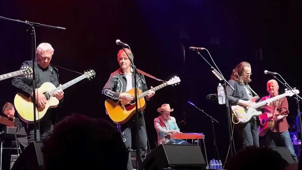 Watch Geddy Lee and Alex Lifeson seem onstage in combination at Gordon Lightfoot tribute display in Toronto