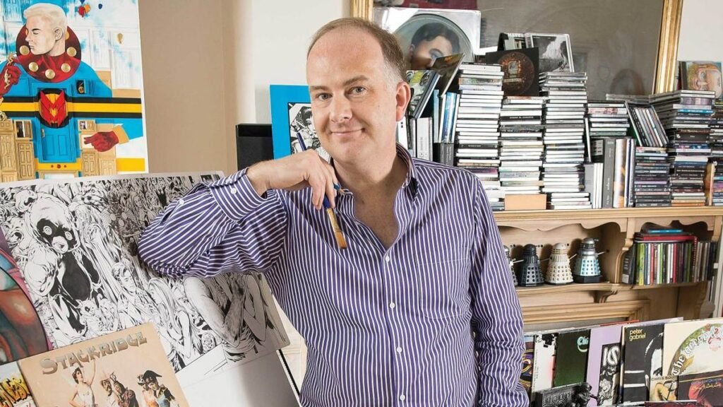 “They caught me in contraptions to verify he wouldn’t get decapitated”: Comedian artist Mark Buckingham on being Peter Gabriel’s stunt double for Sledgehammer