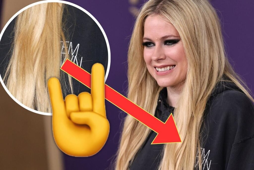 Avril Lavigne Wears Steel Band Hoodie at Nation Song Awards