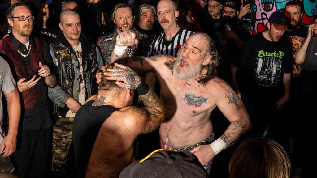 Philadelphia excessive wrestling-themed steel band packs a punch leaving revelers coated in blood, scars & wood stakes