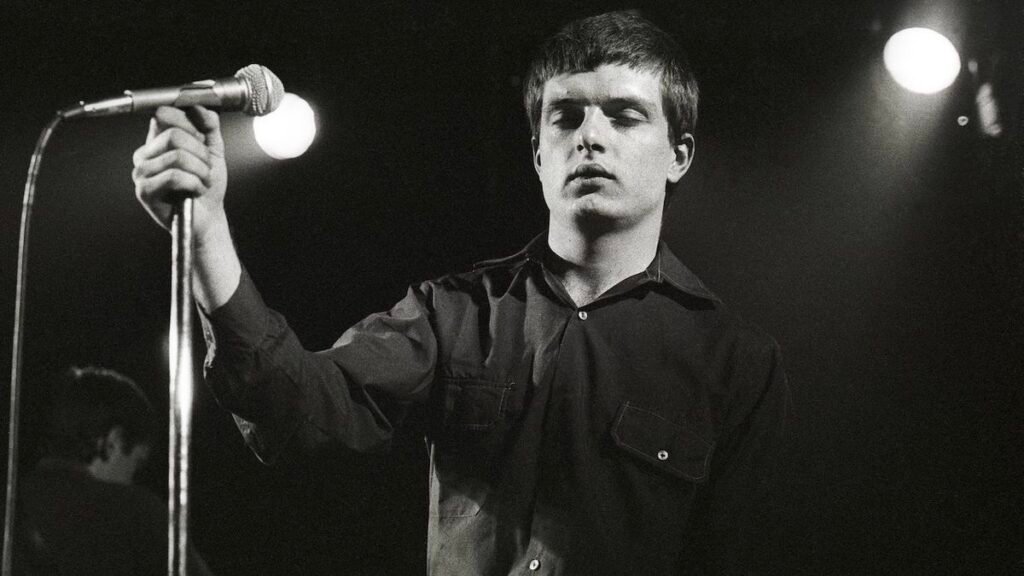 “I slid to the ground in surprise. I didn’t talk, didn’t need to say a phrase to any person.” The day that Pleasure Department realized their good friend and frontman Ian Curtis had died