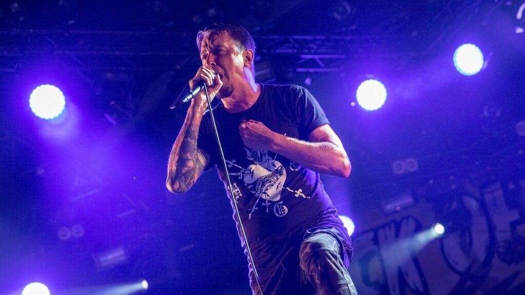 “Sorry to all our enthusiasts and pals however every so often lifestyles blindsides you.” Unwell Of It All pressured to cancel Eu excursion after medical doctors discover a tumor in vocalist Lou Koller’s esophagus “Sorry to all our enthusiasts and pals however every so often lifestyles blindsides you.” Unwell Of It All pressured to cancel Eu excursion after medical doctors discover a tumor in vocalist Lou Koller’s esophagus