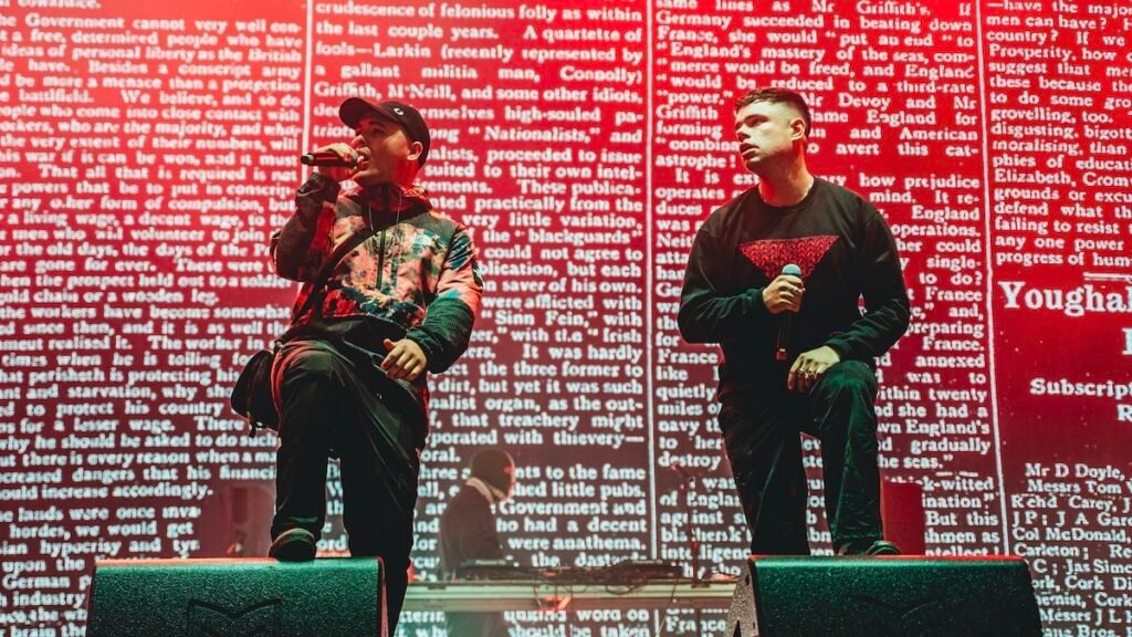 Kneecap, Eire’s maximum provocative rap team, kick off Saturday at Glastonbury in impolite and raucous style