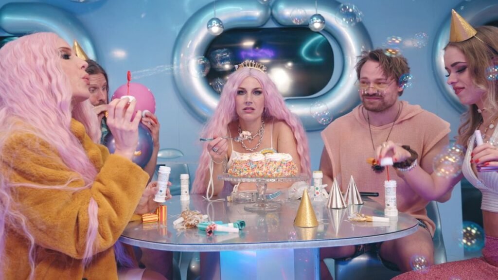 “It was once nice amusing to let free dressed in purple wigs in ball pits and marshmallow swimming pools”: See Charlotte Wessels (ex-Delain) and Simone Simons (Epica) workforce up in flamboyant Dopamine song video
